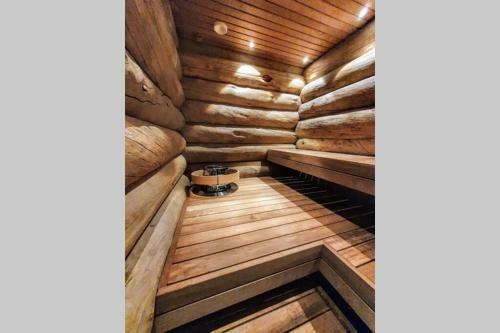 Log Cabin In Lapland By The River