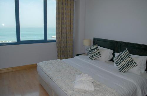 Corniche Suites Hotel