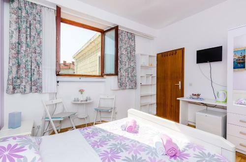 Apartamentos My Corner Rooms