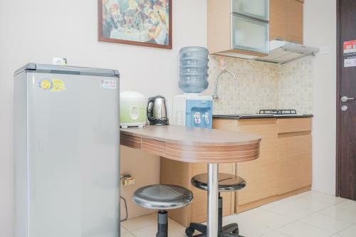 Modern Comfy 2br Serpong Greenview Apartment By Travelio