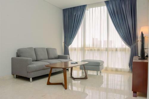 Comfy And Spacious 2br The Masterpiece Epicentrum Apartment By Travelio