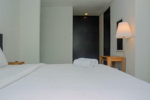 Comfy And Spacious 2br The Masterpiece Epicentrum Apartment By Travelio