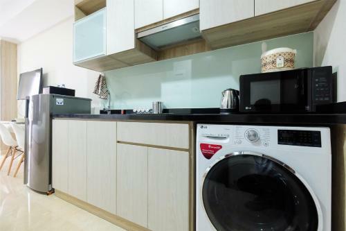 Minimalist Studio Menteng Park Apartment By Travelio