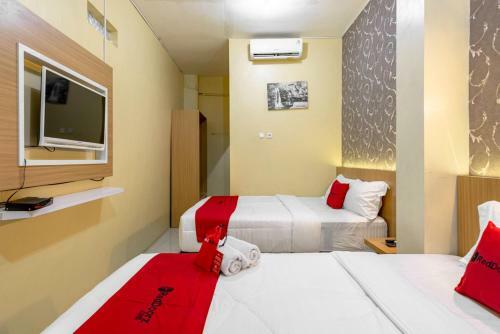 Hostal Reddoorz Near Dino Park