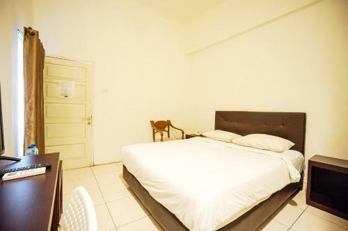 Capital O 3433 Hotel Plaza
