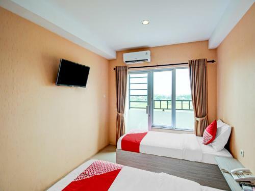 Hotel Oyo 90245 Tridasa