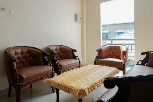 Hostal Reddoorz Near Millenium Waterpark Palu