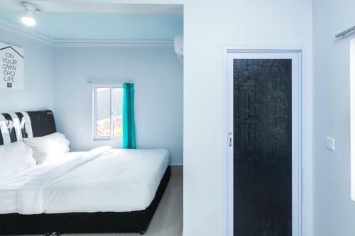 Hotel Oyo Life 2485 Darisa Marshall Kost Syariah