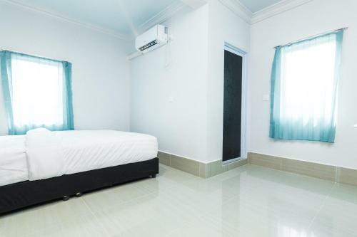 Hotel Oyo Life 2485 Darisa Marshall Kost Syariah
