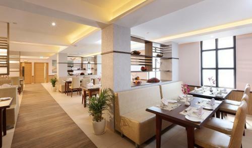Hotel Flora Charishma Residency Aluva