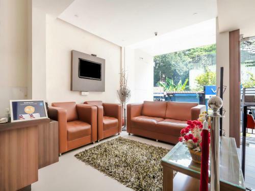 Hotel Capital O 76520 Maharajha Mg Road