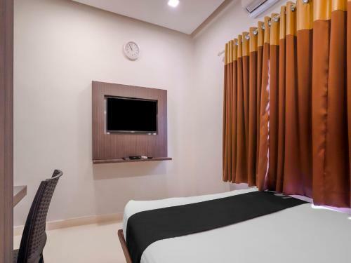 Hotel Capital O 76520 Maharajha Mg Road