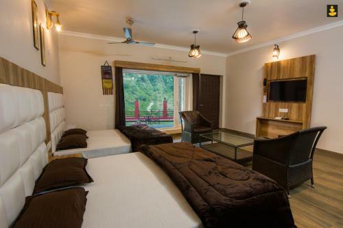 Hotel Sahastradhara Riverresort