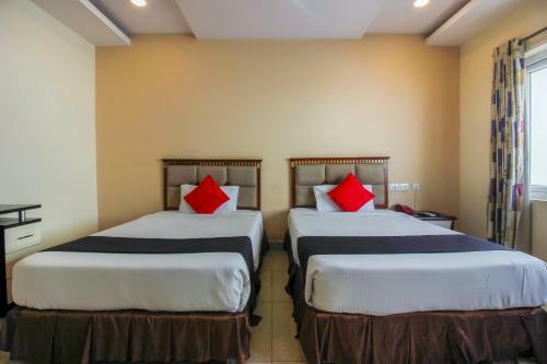 Hotel Capital O 68918 Sravya Grand Residency
