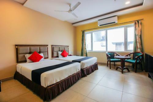 Hotel Capital O 68918 Sravya Grand Residency