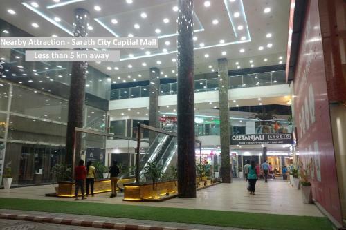 Hotel Capital O 68918 Sravya Grand Residency