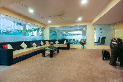 Hotel Capital O 68918 Sravya Grand Residency