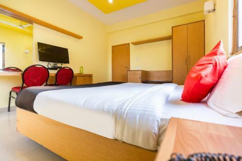 Hotel Capital O 67372 Garuda Suites