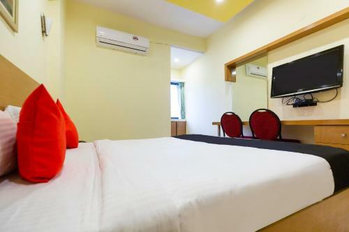 Hotel Capital O 67372 Garuda Suites