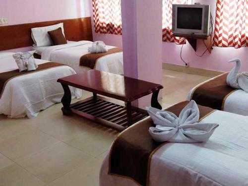 Hotel Navaratna By Pragathi Hospitality