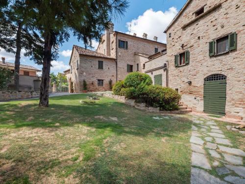 Bewitching Apartment In Mombaroccio With Swimming Pool