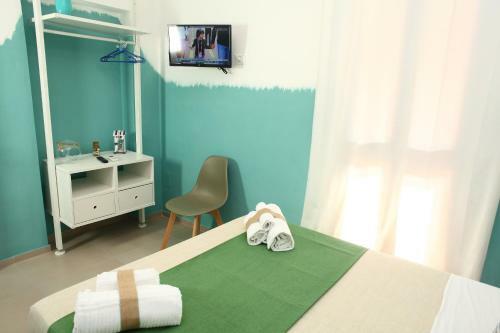 Hostal Beachside Rooms & Suites
