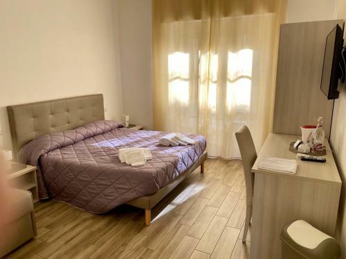 Hostal Caruso Rooms