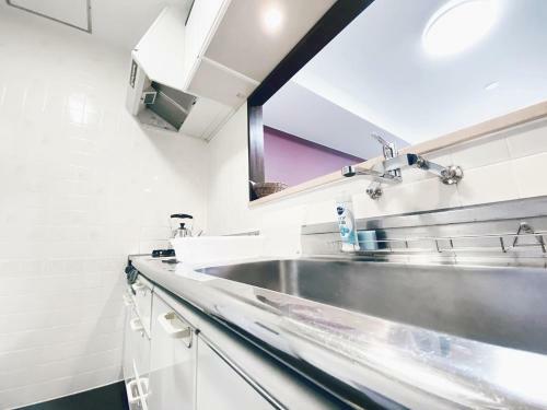 Apartamentos Ouchi Hotel Itsukaichi