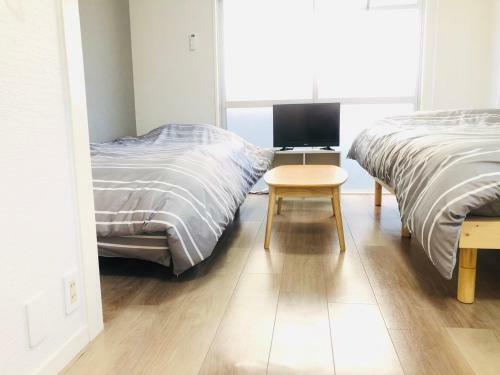 Apartamento Hotel Peace Park Tokaichi