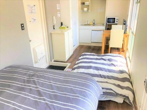 Apartamento Hotel Peace Park Tokaichi