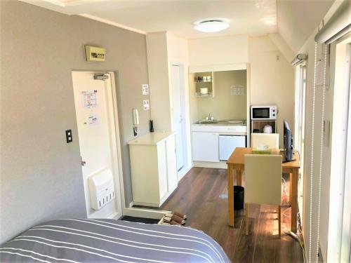 Apartamento Hotel Peace Park Tokaichi