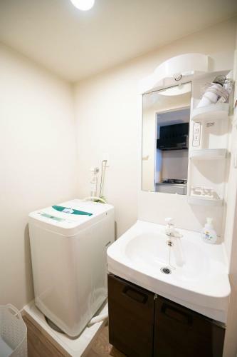 Apartamento Hotel Tomas Asahibashi Station