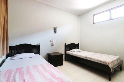 Hostal Taman Mekar Beach Inn