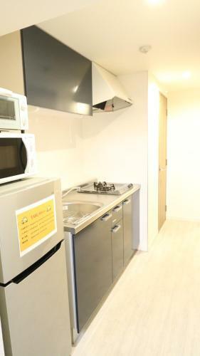 Apartamento Legatio Hakataekihigashi Hotel