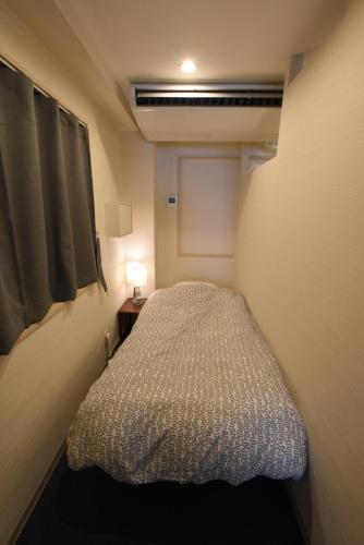 Apartamentos East Toranomon - Kando
