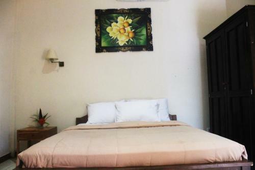 Hotel Taxa Inn Kuta Raya