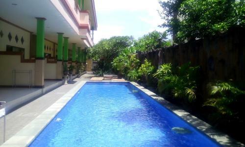 Hotel Taxa Inn Kuta Raya