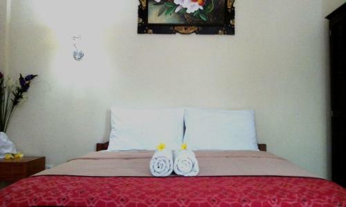 Hotel Taxa Inn Kuta Raya