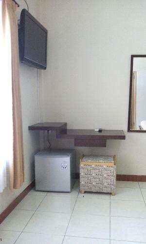 Hotel Taxa Inn Kuta Raya