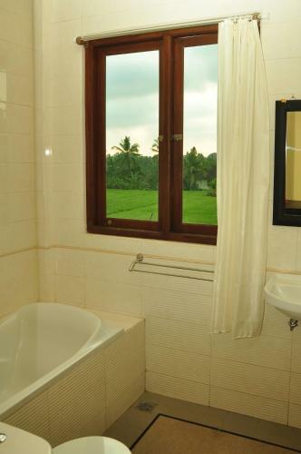 Hostal Three Dewi's Guest House