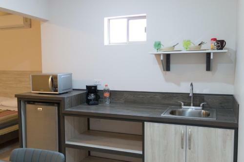 Albergue Magnolias Suites Hotel