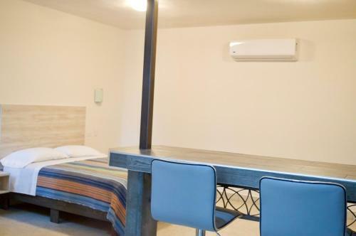 Albergue Magnolias Suites Hotel