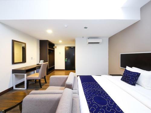 Capital O 978 Midaris Hotel
