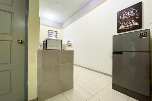 Hotel Oyo 90212 Anna Kota Apartment