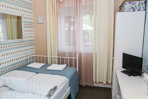Hostal Holly Vend�gh�z