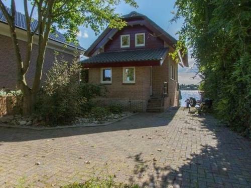 Waterfront Holiday Home In Veen With Terrace