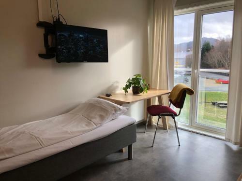 Tau Apartment Hotel