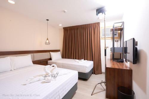 Griffin Hotel And Suites