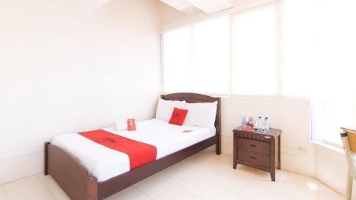 Hotel Reddoorz Plus @ E Rodriguez Corner Banawe