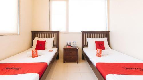 Hotel Reddoorz Plus @ E Rodriguez Corner Banawe